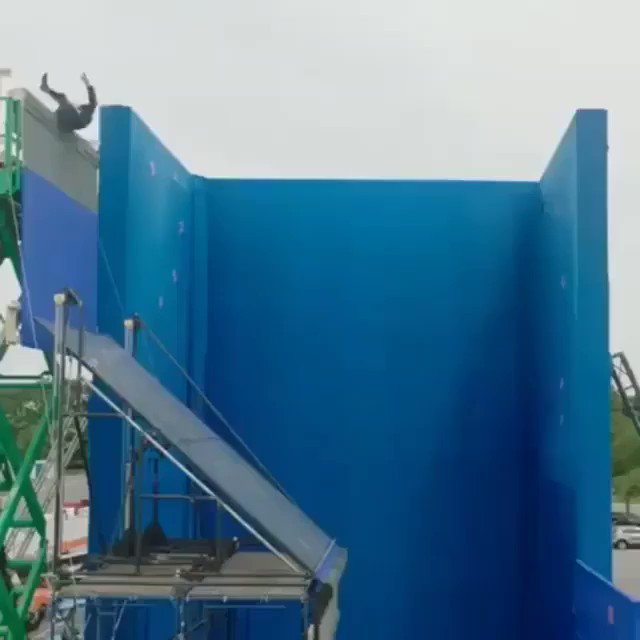 John Wick 3 behind t